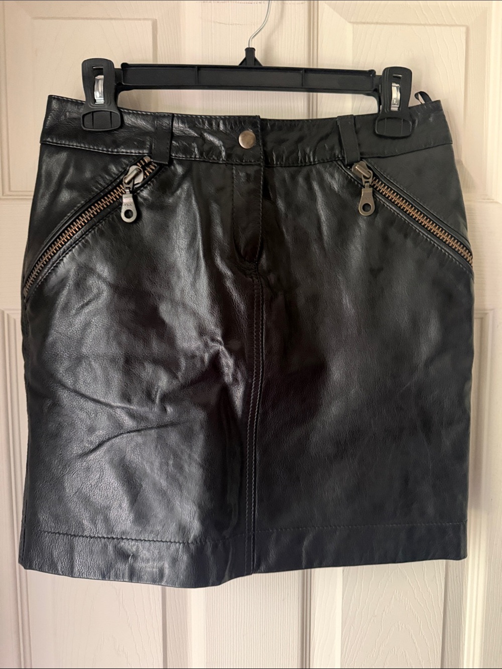 Black Leather Mini Skirt with Diagonal Zip Pockets